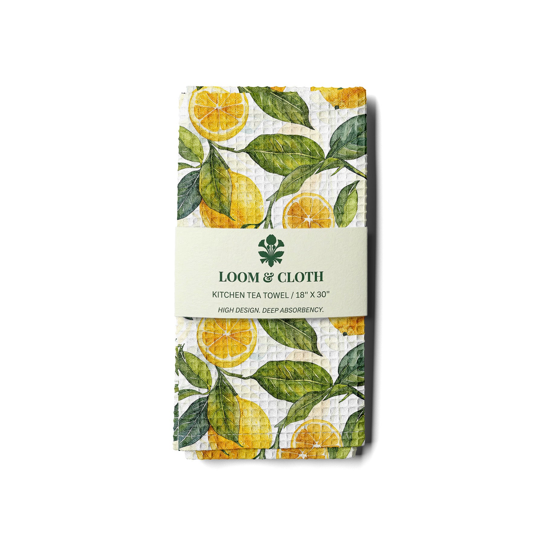kitchen tea towel with lemon design on a white background