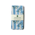 kitchen tea towel with floral design and 'Loom & Cloth' branding on a white background