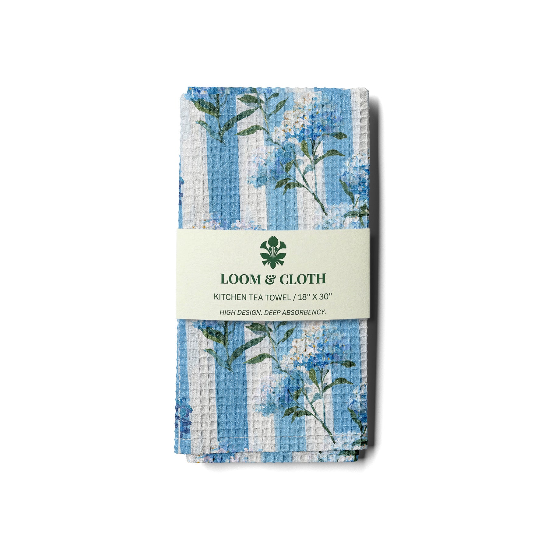 kitchen tea towel with floral design and 'Loom & Cloth' branding on a white background