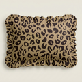 Leopard print pillow on a beige background