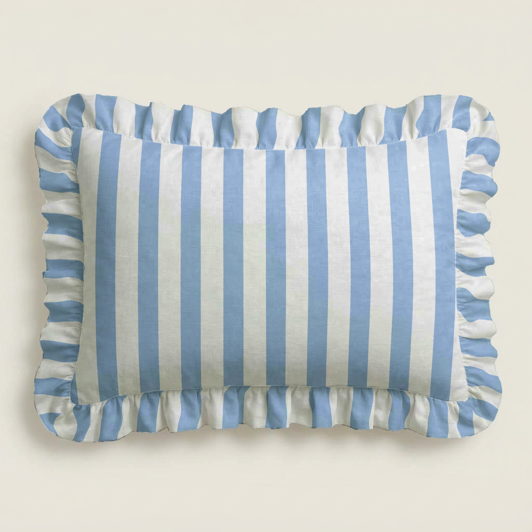 Rectangular pillow with blue and white striped pattern on a beige background