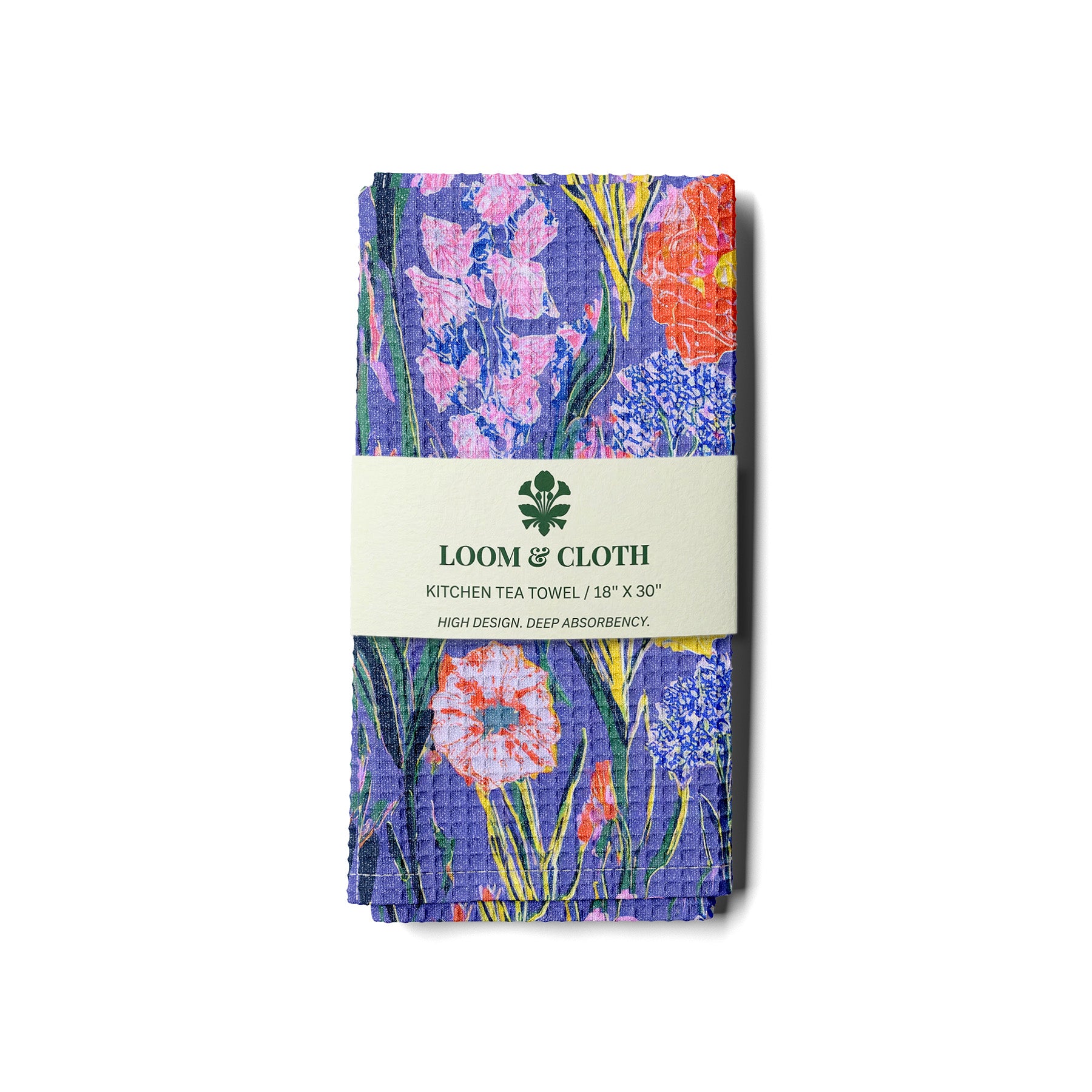 Floral kitchen tea towel with 'Loom & Cloth' branding on a white background