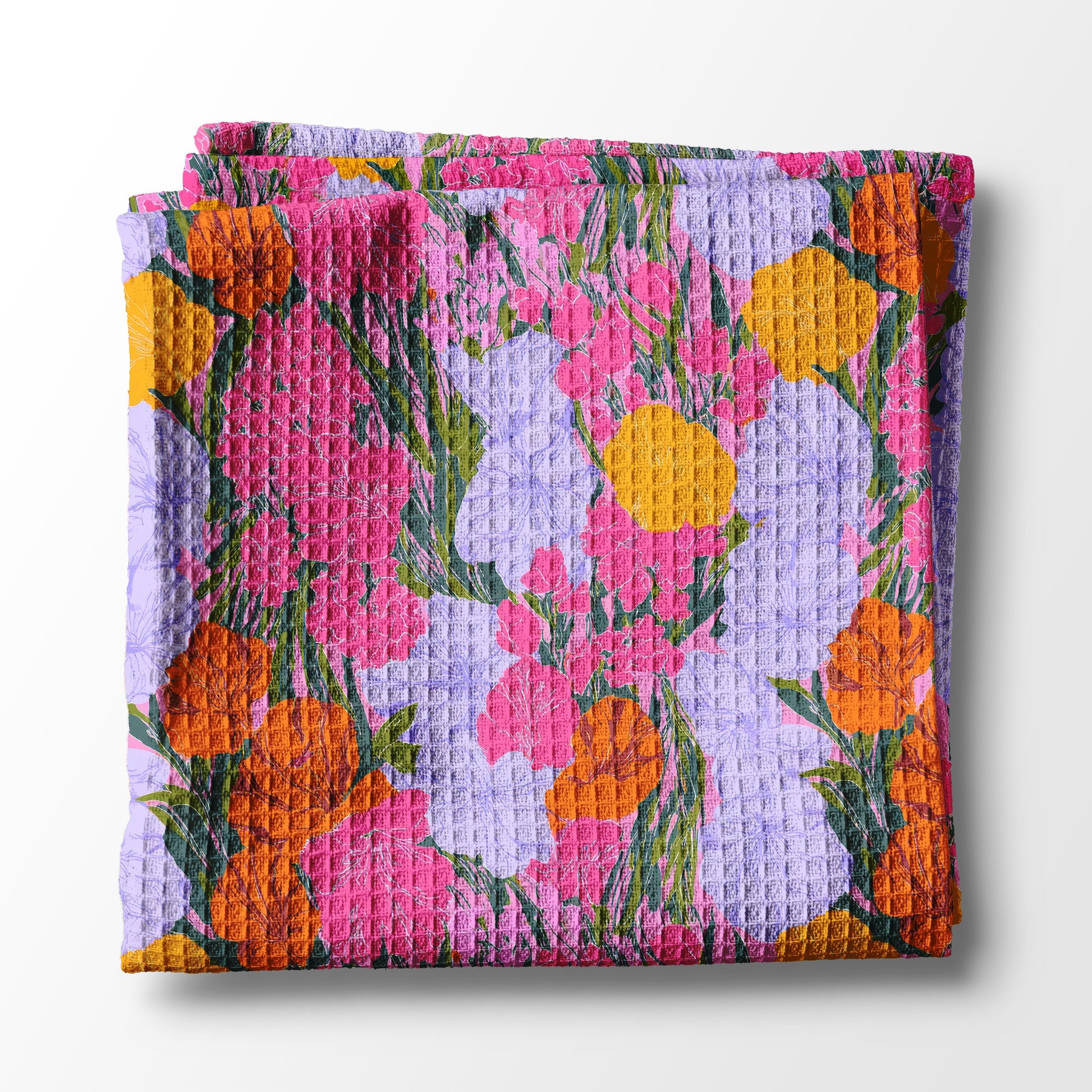 Floral-patterned kitchen towel on a white background
