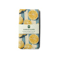 kitchen tea towel with lemon and stripes design on a white background