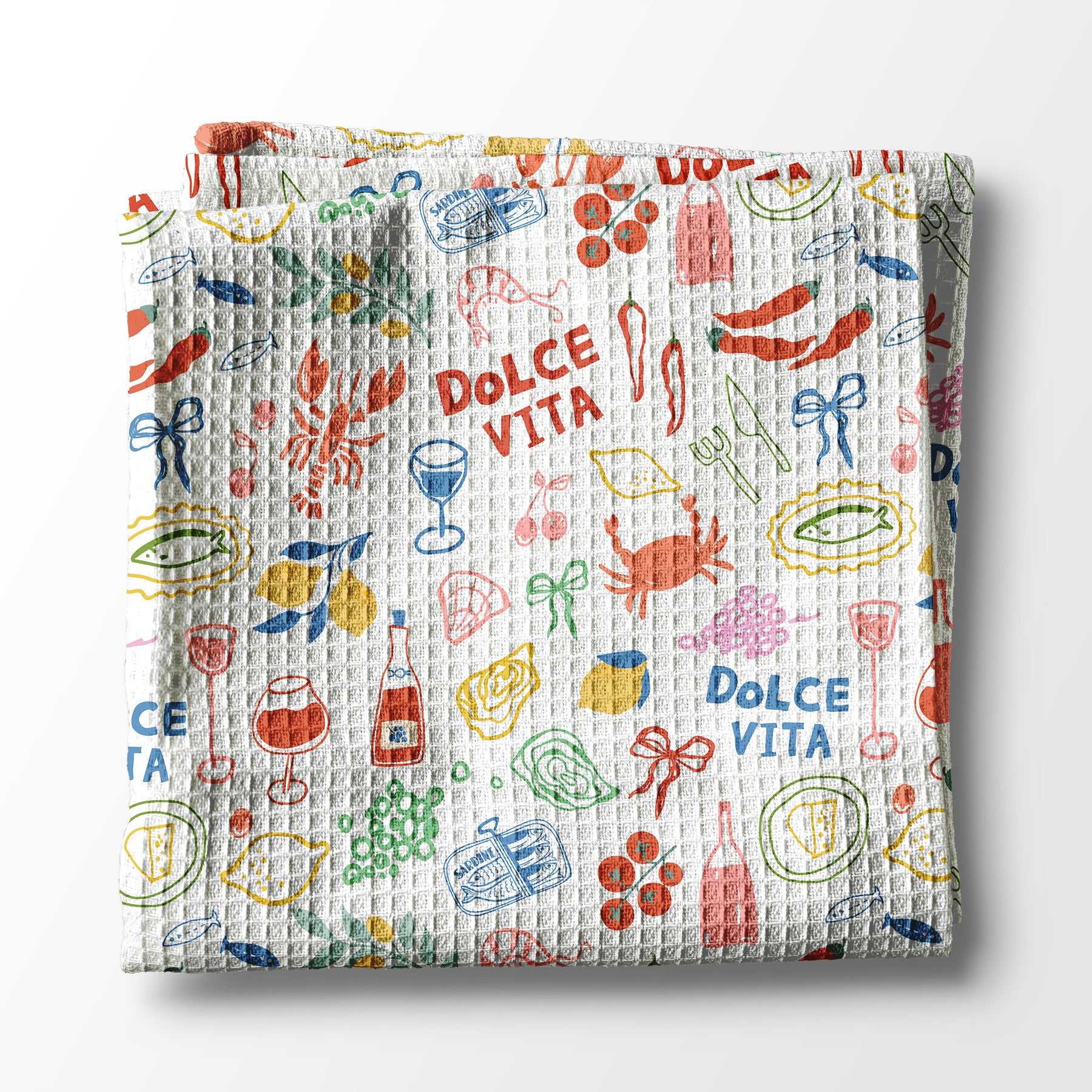 kitchen towel with colorful Italian-themed design and 'Dolce Vita' text on a white background