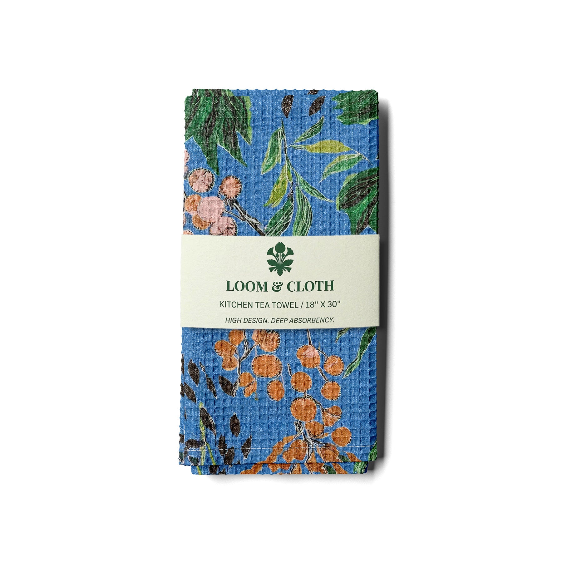 kitchen tea towel with floral design and Loom & Cloth branding on a white background