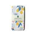 kitchen tea towel with lemon and tile pattern on a white background