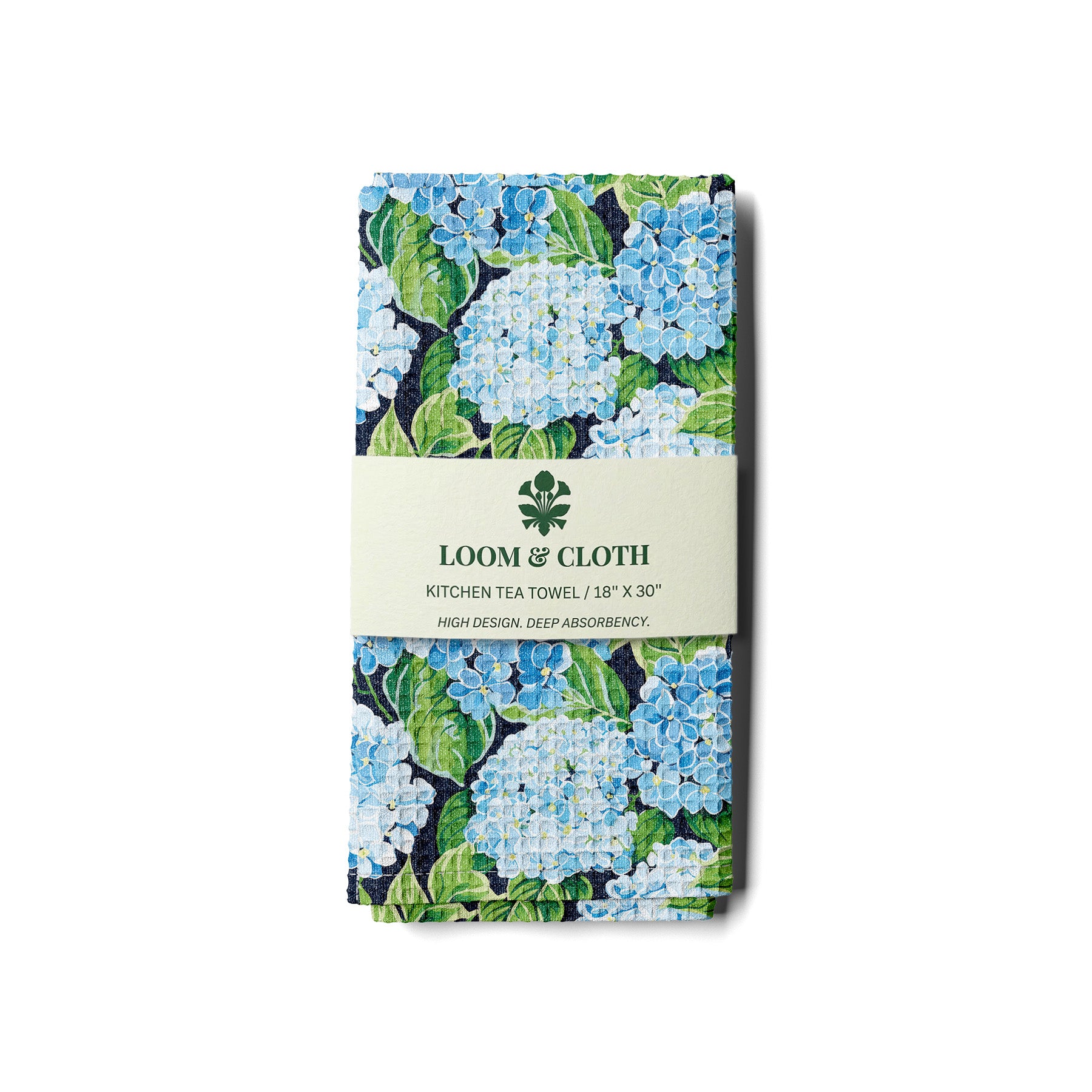 kitchen tea towel with floral design and 'Loom & Cloth' branding on a white background