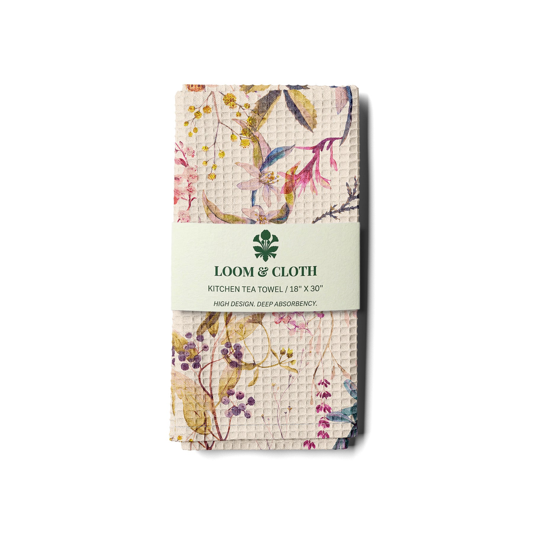 kitchen tea towel with floral design and Loom & Cloth branding on a white background