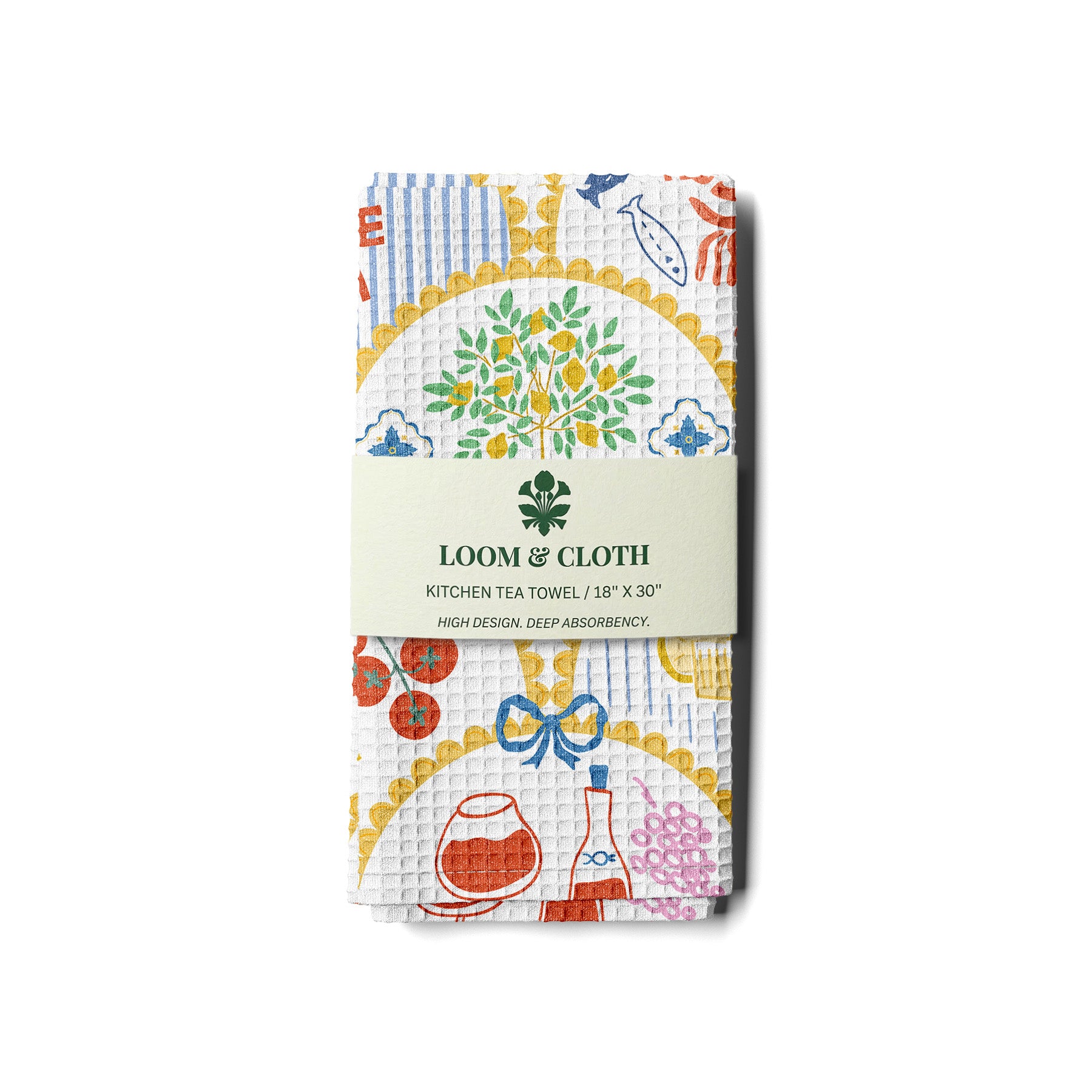 Loom & Cloth kitchen tea towel with colorful designs on a white background