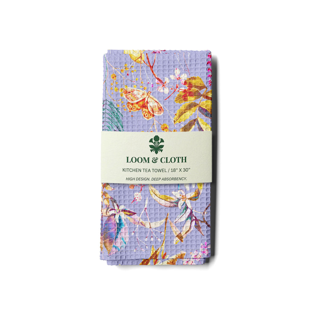 kitchen tea towel with fairy design on a white background, branded 'Loom & Cloth'.
