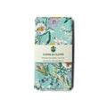 kitchen tea towel with floral design on a white background