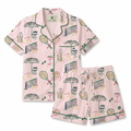Pink pajama set with tennis-themed pattern on a white background