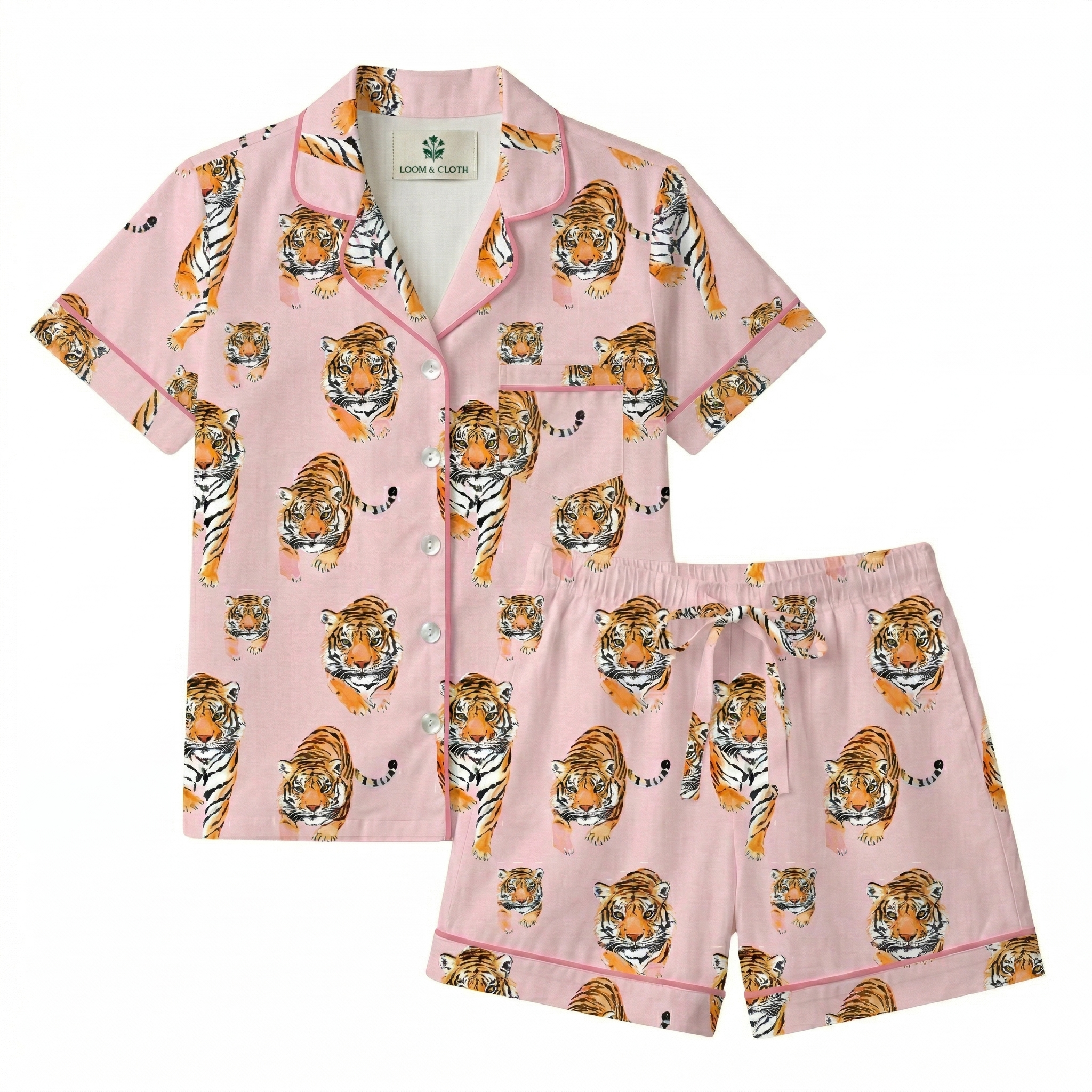 Pink pajama set with tiger pattern on a white background