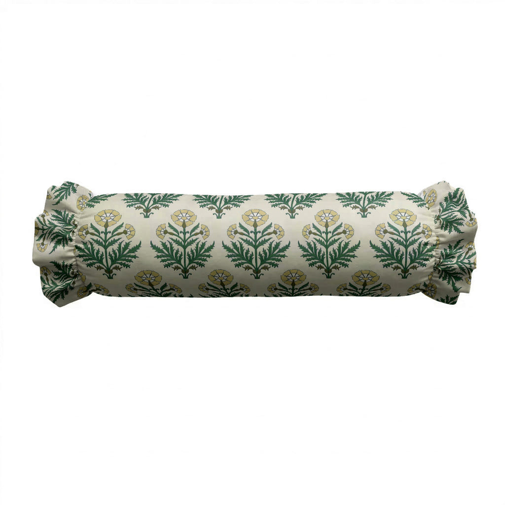 Rolled-up fabric with green leaf pattern on a white background