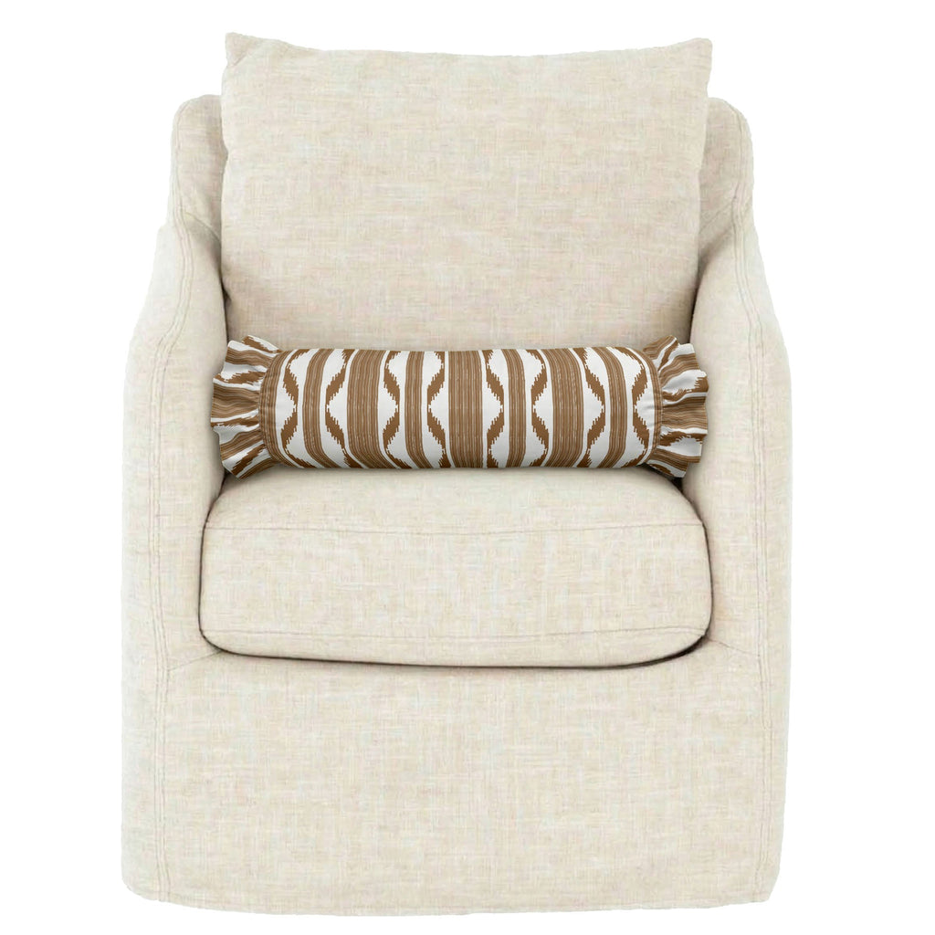 Beige armchair with a decorative pillow on a white background