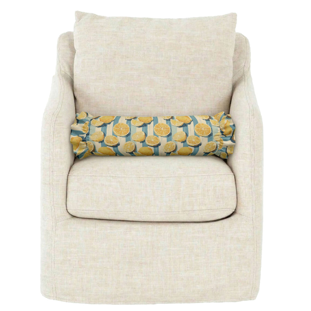 Beige armchair with a decorative cylindrical pillow featuring yellow patterns on a white background