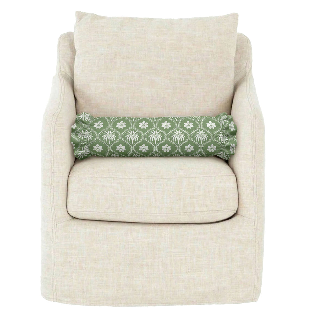 Beige armchair with a decorative pillow on a white background