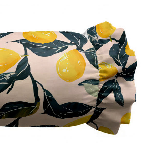 Fitted sheet with lemon and leaf pattern on a white background