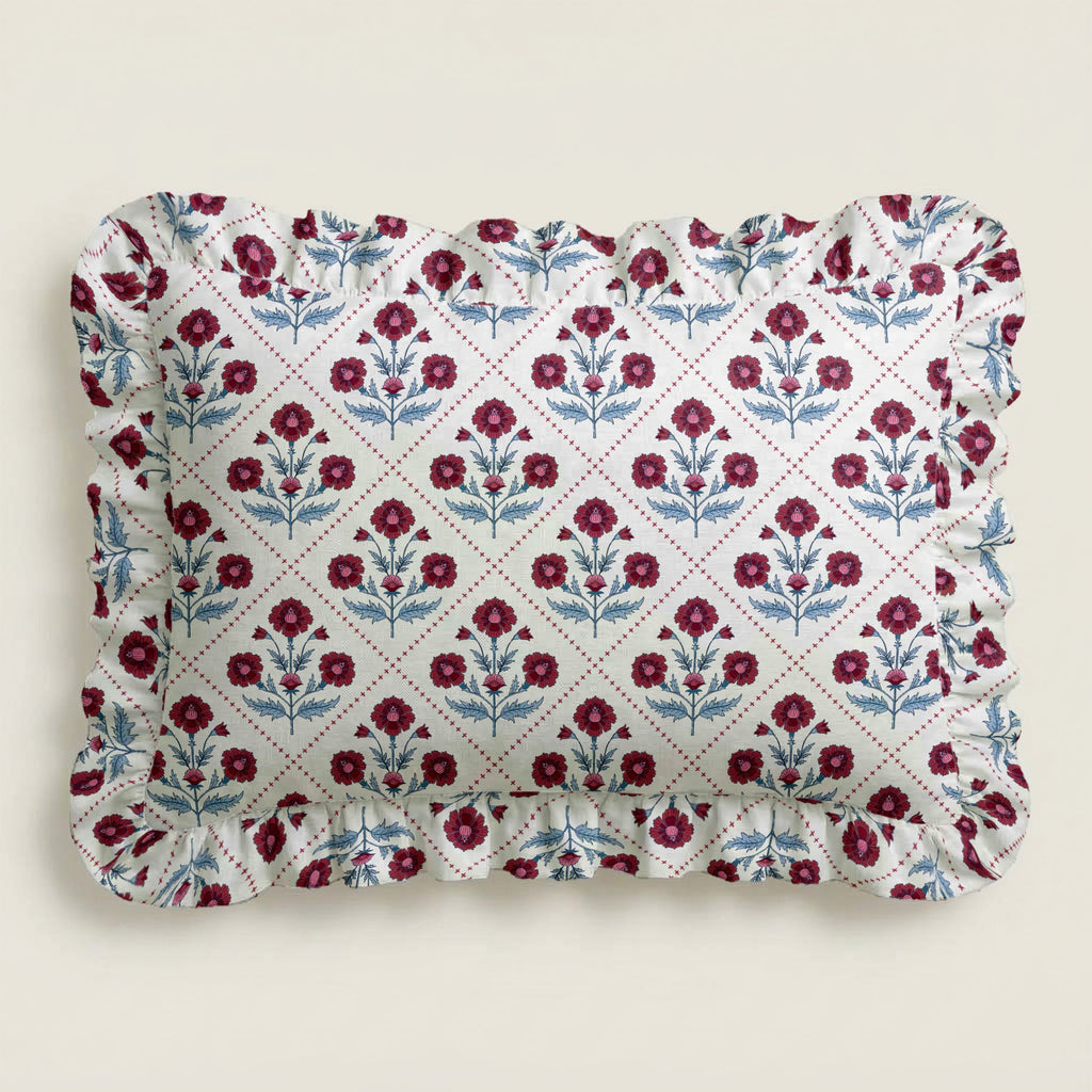 Floral patterned fabric with ruffled edge on a beige background