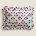 Floral patterned fabric with ruffled edge on a beige background