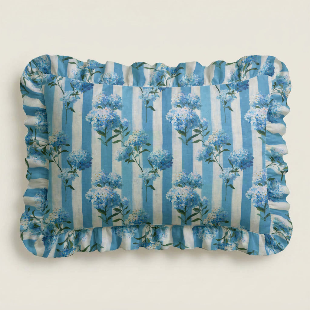 Rectangular fabric tray with blue floral and striped pattern on a beige background