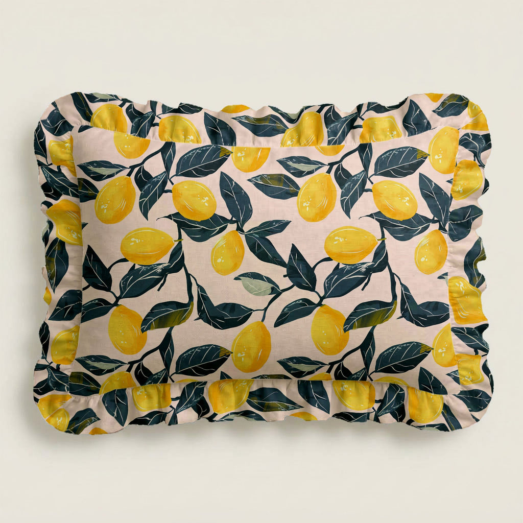 Rectangular pillow with lemon and leaf pattern on a light background