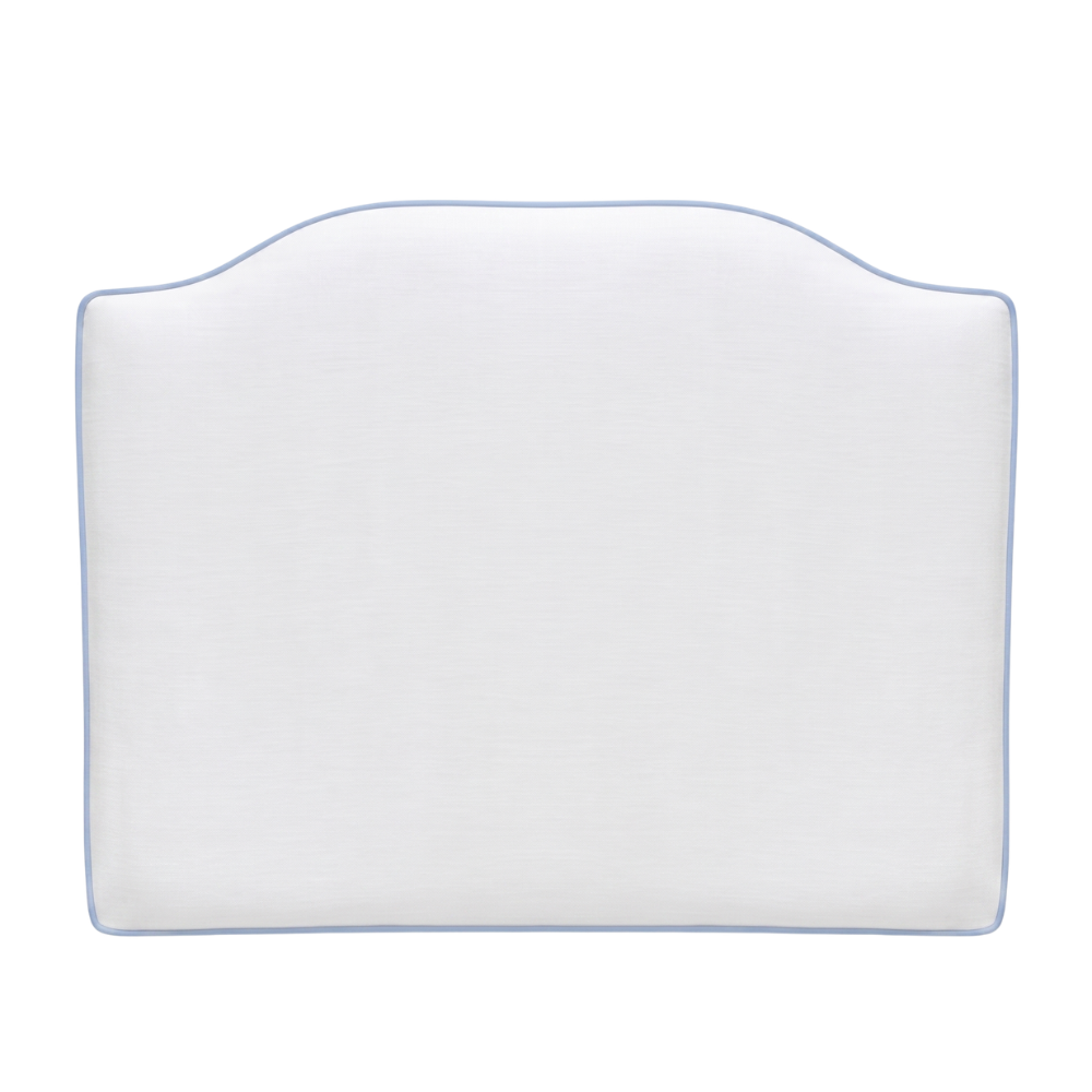 White headboard with blue piping on a light background