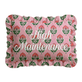 Floral-patterned pillow with 'High Maintenance' text on a pink background