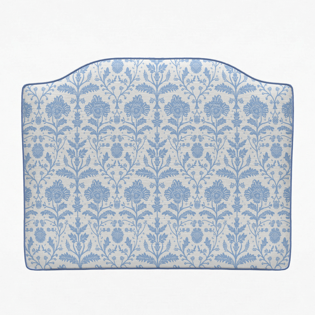 Decorative headboard with blue floral pattern on a white background