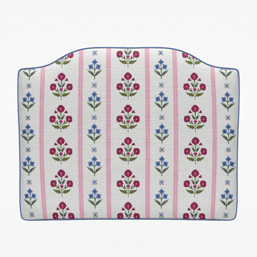 Floral patterned cushion with pink stripes on a white background