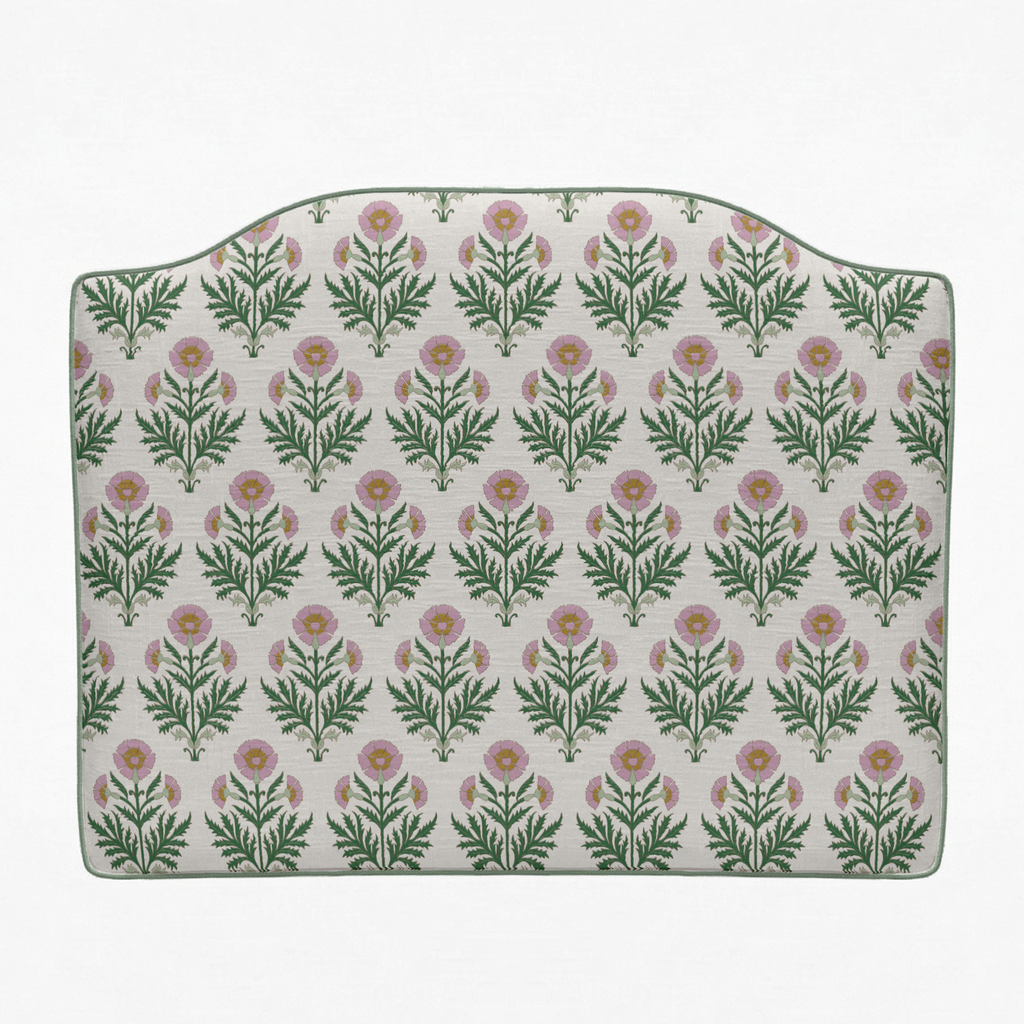Floral patterned headboard on a white background