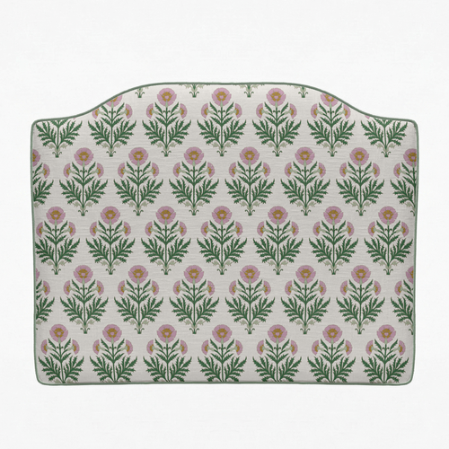 Floral patterned headboard on a white background