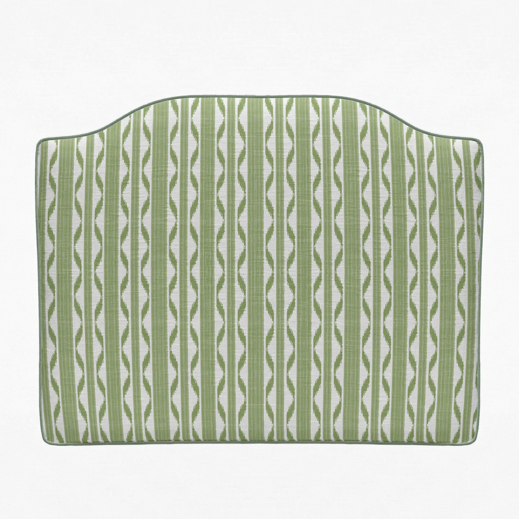 Green and white striped headboard on a white background