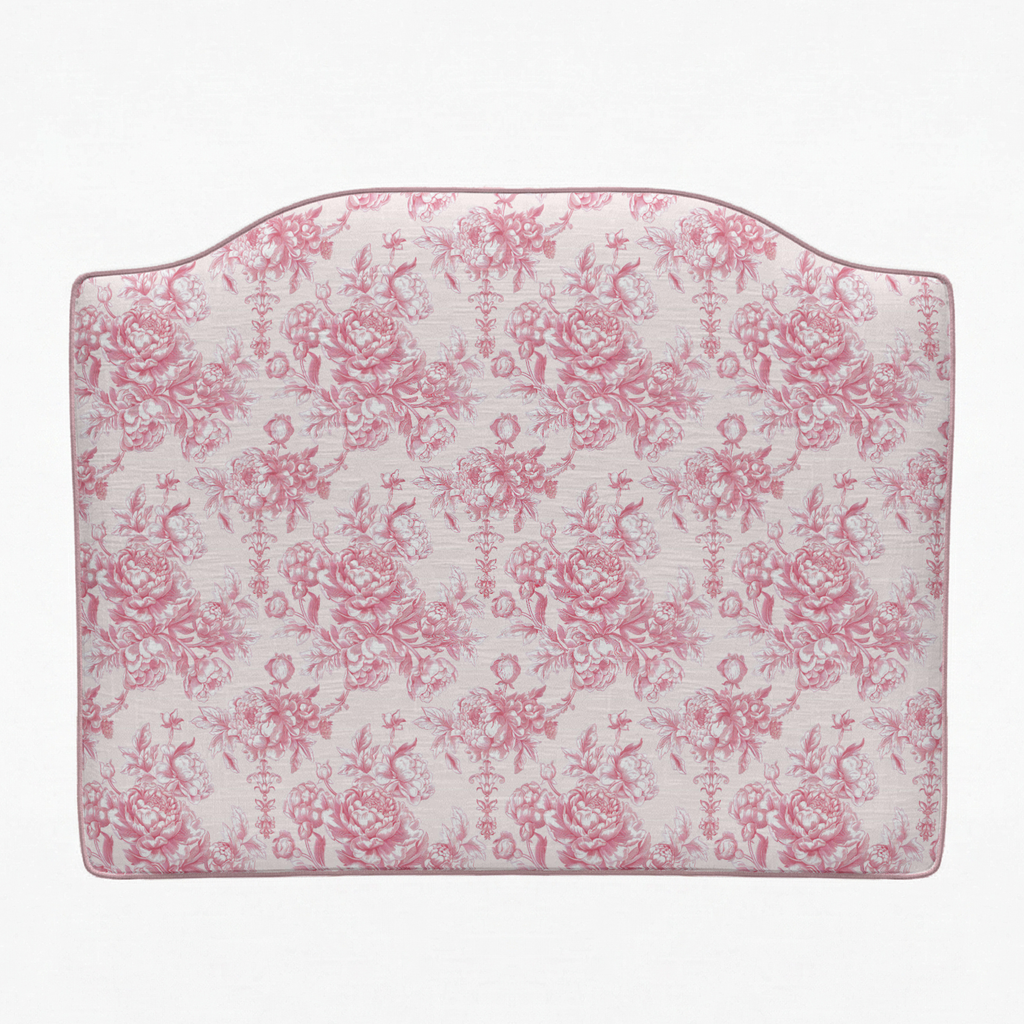 Floral patterned headboard on a white background