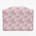 Floral patterned headboard on a white background